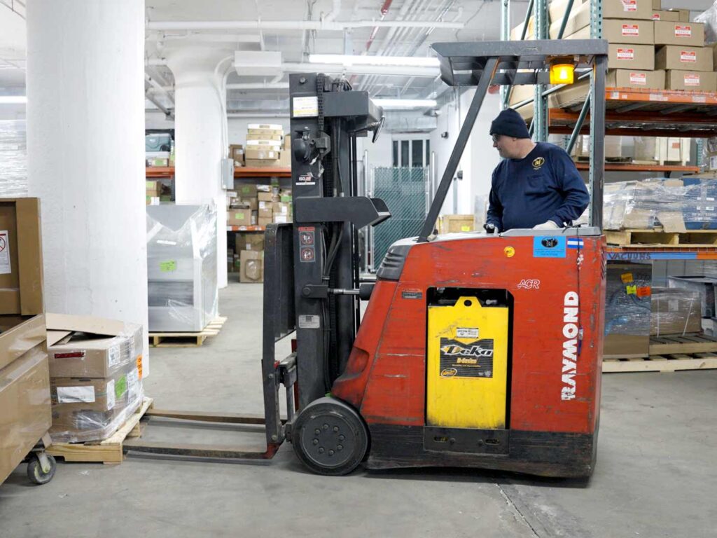 henick lane warehouse worker forklift