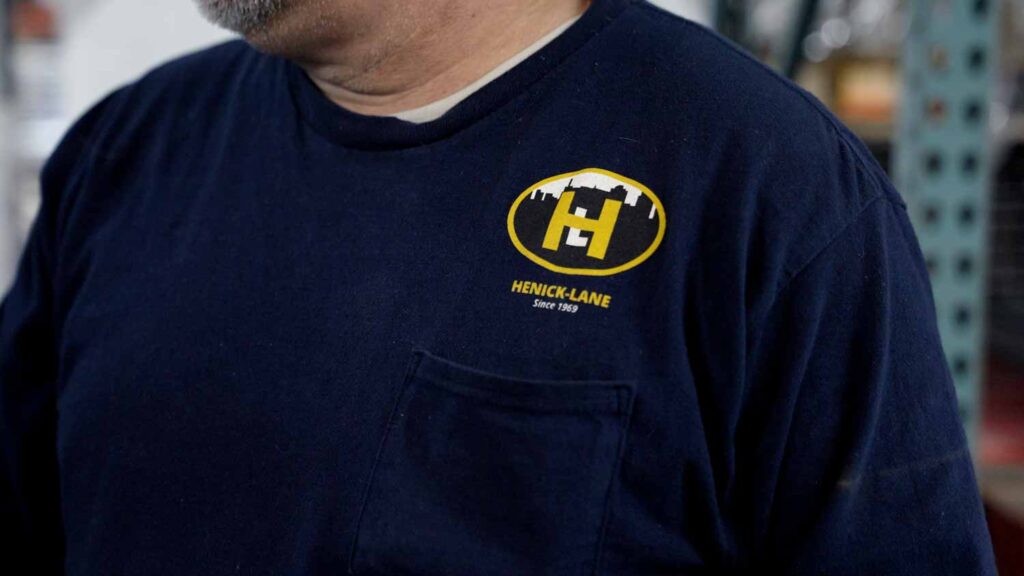 henick logo on t shirt